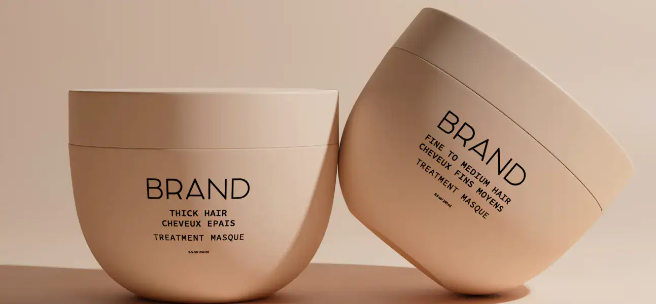 Labeled hair treatment masque containers for thick and medium hair by MISTURA.